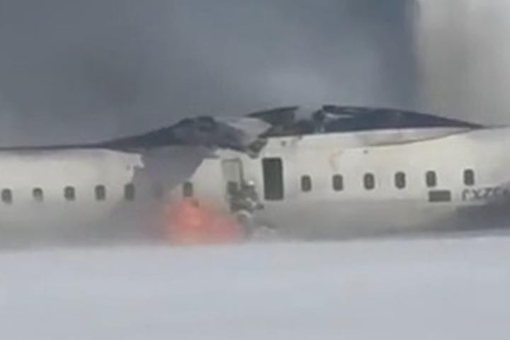 Delta Plane Bursts Into Flames Before Flipping on Toronto Runway 4 Delta Plane Bursts Into Flames Before Flipping on Toronto Runway