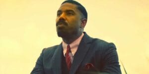 michael b jordan looking off into the distance in sinners