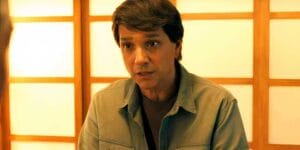 daniel is looking at mr han in karate kid legends